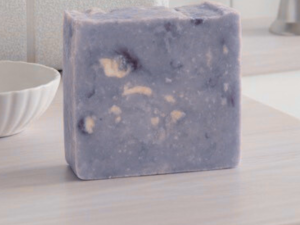 hippie love goat milk soap bar on counter